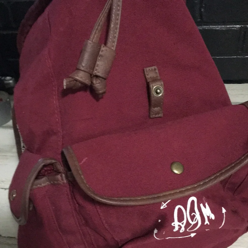 Burgundy cloth back pack white handles & white crochet flower overlay on flap